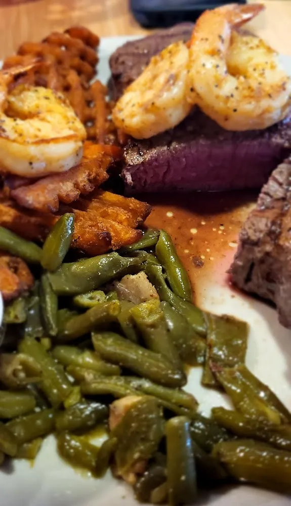 La Salle County Ribeye with a Side of Sweet Potato Waffle Fries and Green Beans